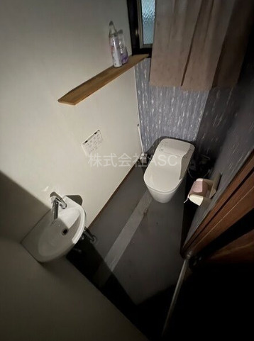 生野区林寺三丁目店舗付住宅のトイレ