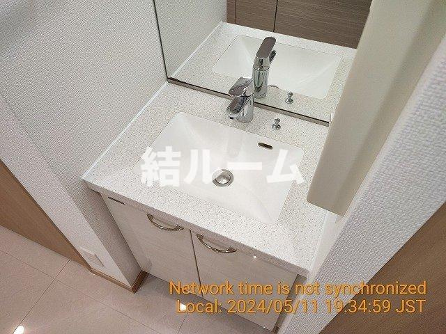 板橋区板橋２丁目の賃貸マンションの洗面所