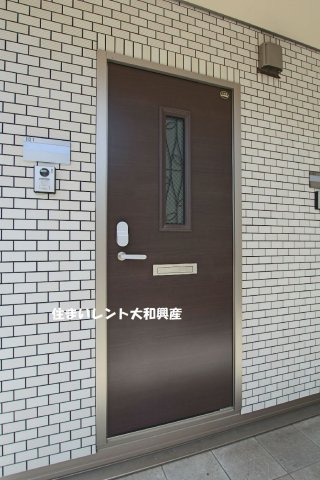 クアトロ　フェリチータの玄関