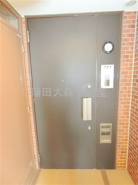 東矢口分譲マンションの玄関