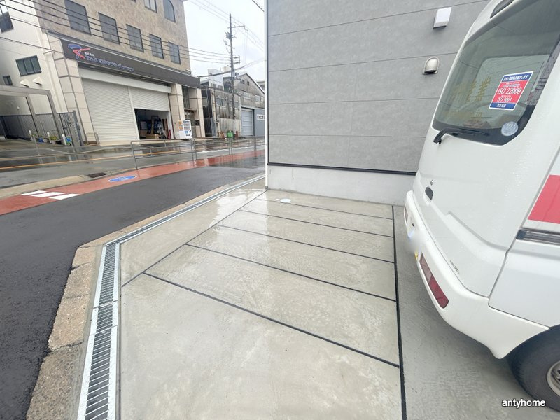 ハーモニーテラス豊里　仲介手数料無料の駐車場