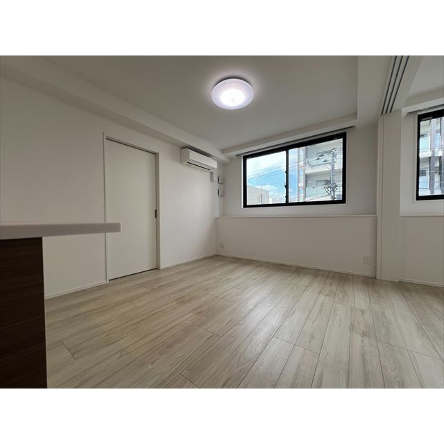 ACP Residence 中野新橋の居間・リビング|※写真は0301号室