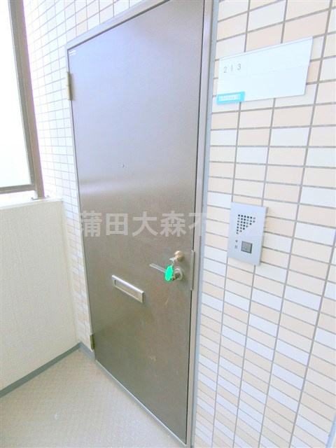 日神パレス平和島の玄関
