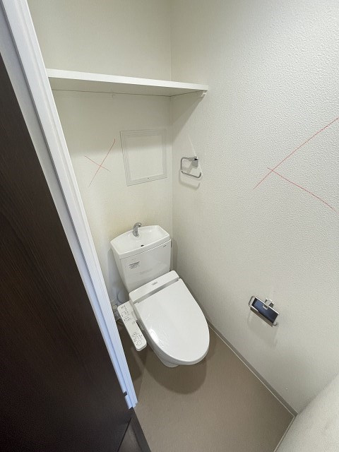 西宮市段上町２丁目の賃貸マンションのトイレ