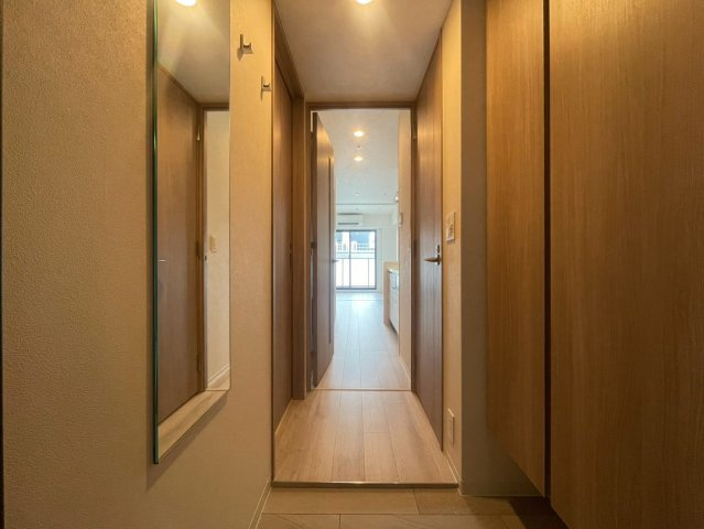 コンフォリア・リヴ本町WEST　Qの玄関
