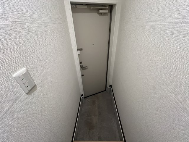 神戸市東灘区岡本２丁目の賃貸マンションの玄関