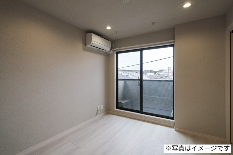 府中市住吉町４丁目のアパートの寝室