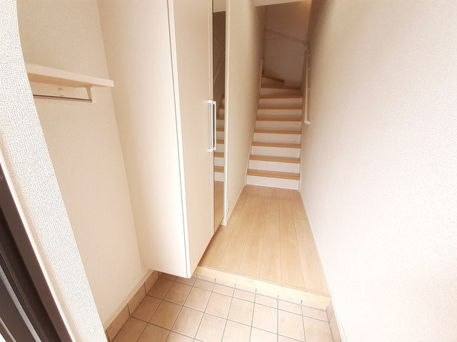 シン　タウン　ソレイユの玄関