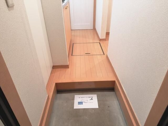 プレジール柏の玄関