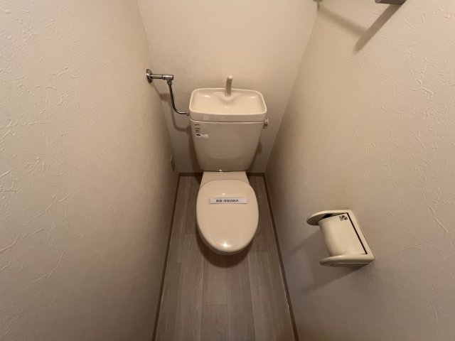札幌市白石区菊水一条４丁目の賃貸マンションのトイレ