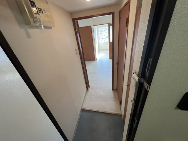 札幌市白石区菊水一条４丁目の賃貸マンションの玄関