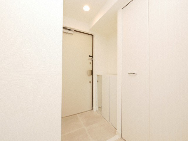 アドバンス上町台シュタットの玄関