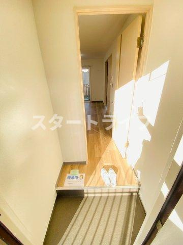 大阪市東淀川区豊新３丁目の賃貸マンションの玄関