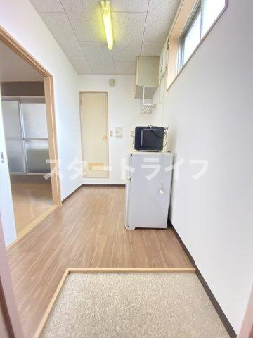大阪市東淀川区西淡路１丁目の賃貸マンションの玄関