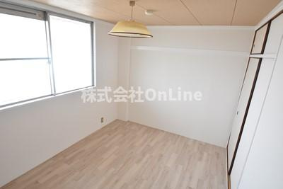 八尾市亀井町３丁目の賃貸マンションの寝室