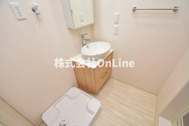 リバーサイド東久宝寺十番館の洗面所