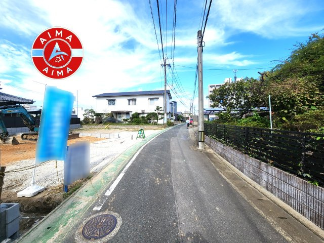 福岡市博多区板付2丁目第2-1棟（1号棟）の外観|前面道路含む現地の写真です。