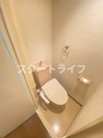 大阪市淀川区西三国１丁目の賃貸マンションのトイレ