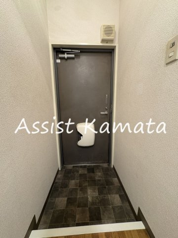 ロイヤルハイツ都南の玄関