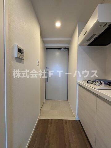 ケイディーエックスレジデンス原木中山の玄関
