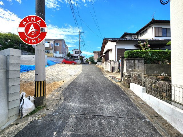 福岡市南区若久5丁目第6-2棟（1号棟）の外観|前面道路含む現地の写真です。