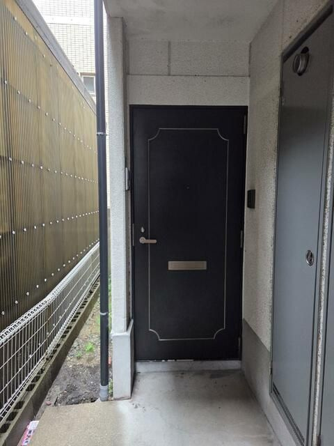 Ｋマンションムサシの玄関