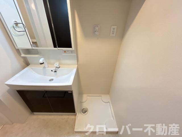 サニーフラットの洗面所|洗濯機置場