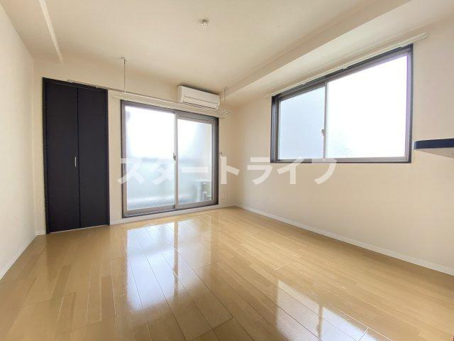 大阪市淀川区木川東２丁目の賃貸マンションの居間・リビング