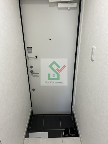 ティージェーレジデンストコロザワの玄関