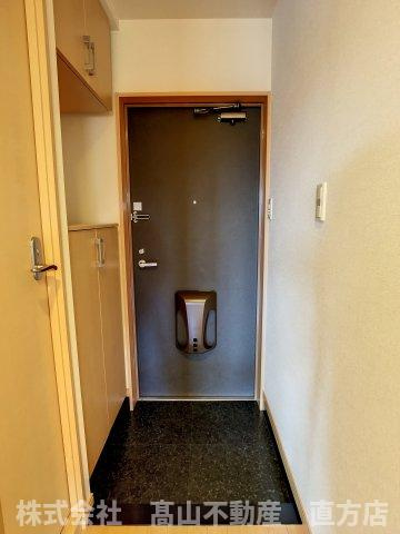 直方市大字頓野のアパートの玄関