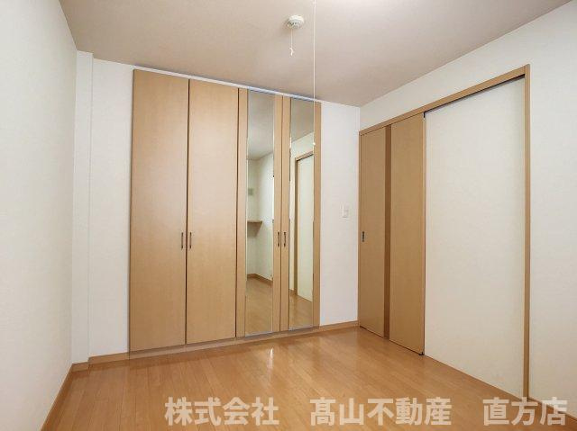 直方市大字頓野のアパートの寝室