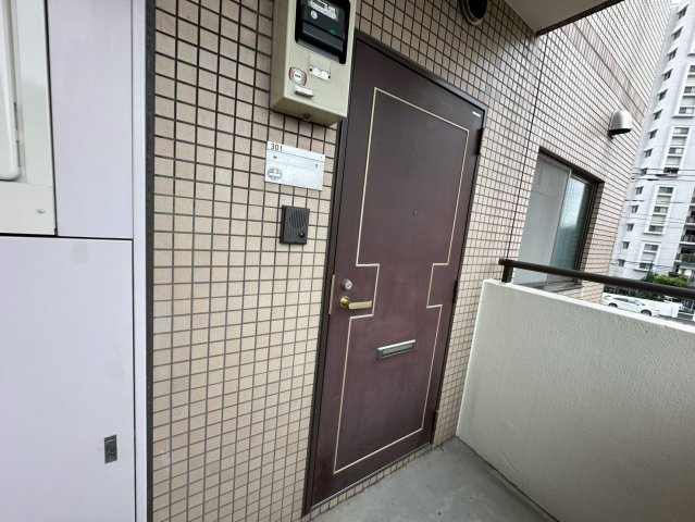 メゾンTANAKAの玄関
