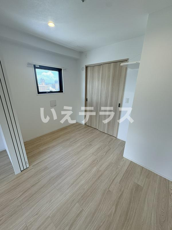 MAISHIN神戸三宮EASTの寝室