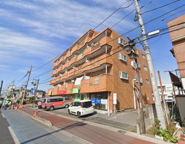 埼玉県春日部市大場　店舗付き一棟マンションの外観