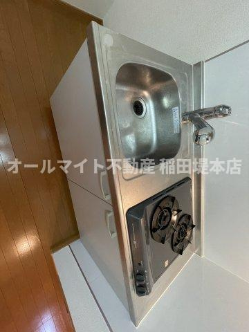 稲城市矢野口のアパートのキッチン