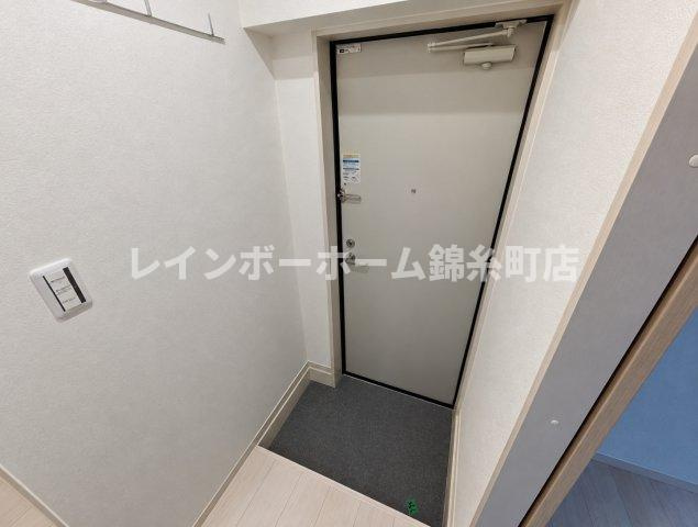 アイウシ梅島の玄関