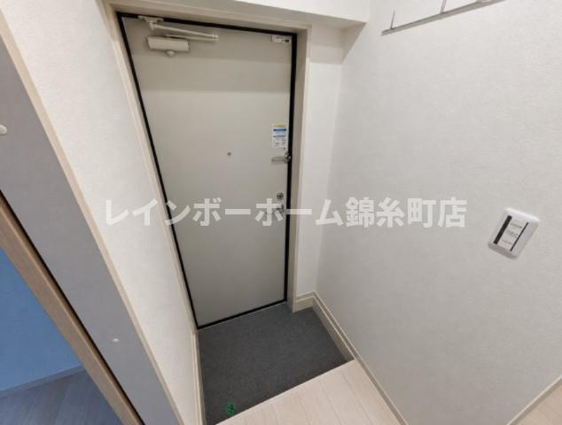 アイウシ梅島の玄関