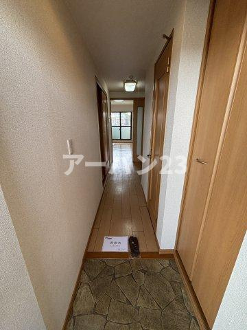 プロスペリタの玄関|同物件反転部屋写真