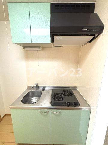 プロスペリタのキッチン|同物件反転部屋写真