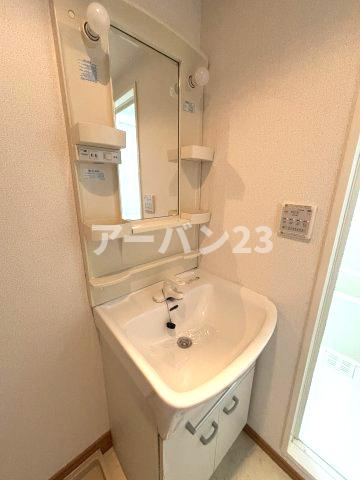 プロスペリタの洗面所|同物件反転部屋写真