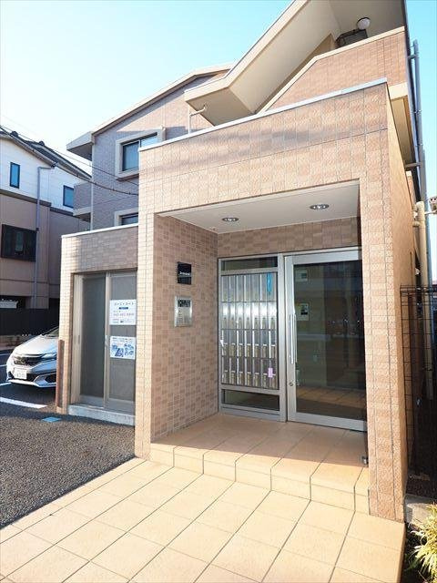 コージィコートのエントランス