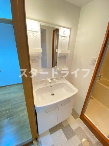 大阪市東淀川区小松２丁目の賃貸マンションの洗面所