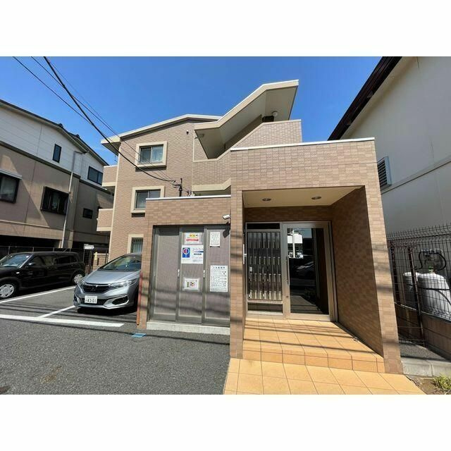 コージィコートのエントランス