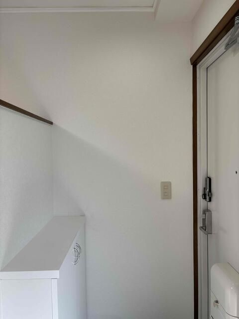 ＷＩＮＧマンションの玄関