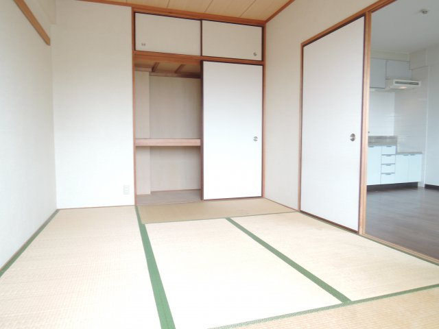プランドール千里丘の寝室