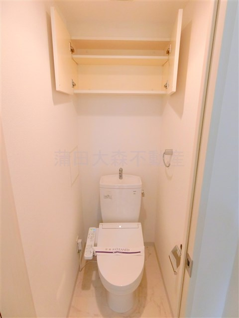 ドゥーエ蒲田のトイレ|トイレ　温水洗浄便座　棚付き