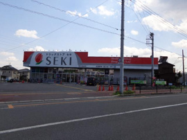 ドラッグストアセキ武州長瀬店まで991ｍ