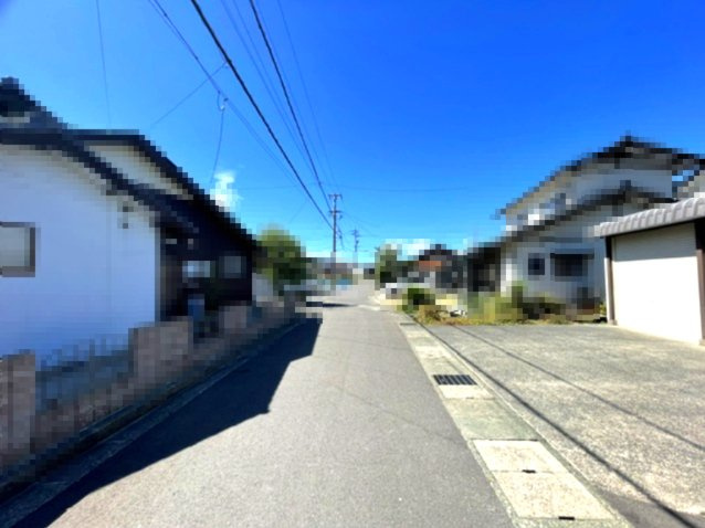 敦賀市山泉96坪車庫付き売地の前面道路含む現地写真