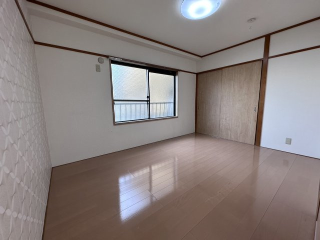 サンシャイン川添の洋室