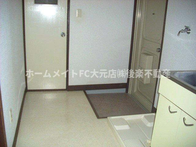 めるへんかがしやの玄関